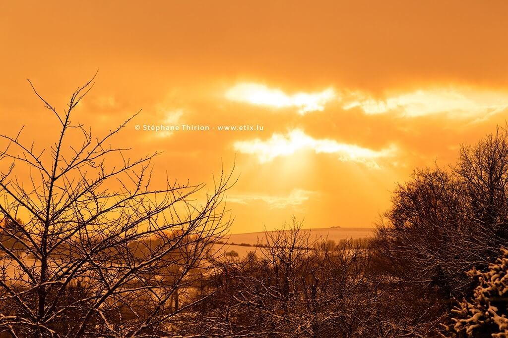 Coucher de-soleil et neige St&eacute;phane Thirion province de Luxembourg